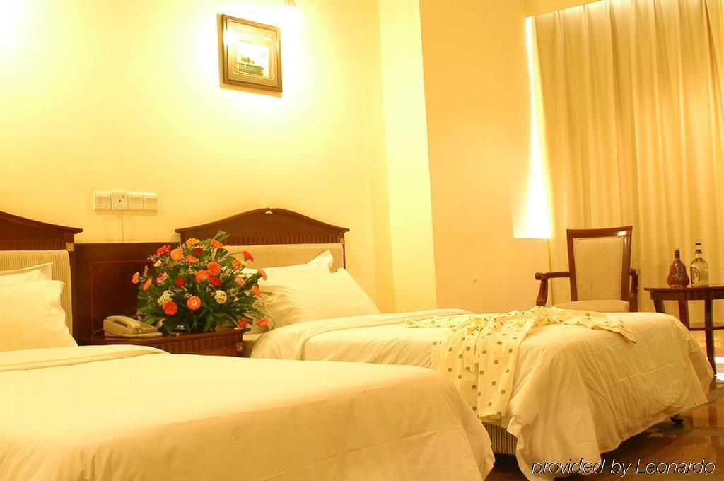 Harvest Seaview Hotel Санья Номер фото