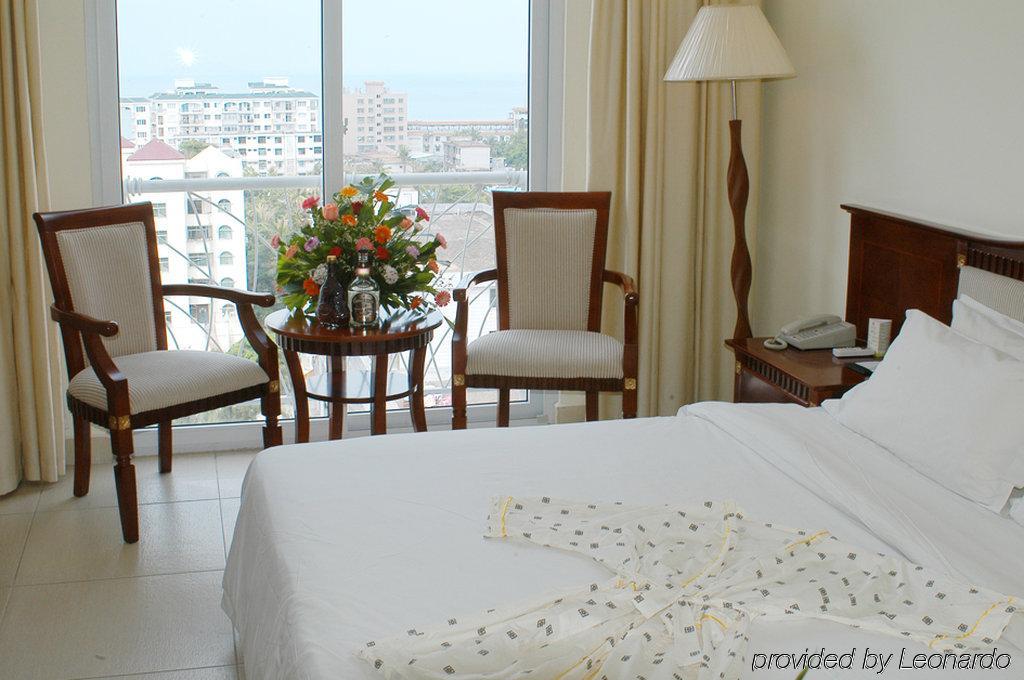 Harvest Seaview Hotel Санья Номер фото