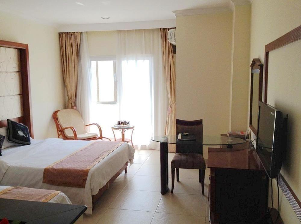 Harvest Seaview Hotel Санья Экстерьер фото
